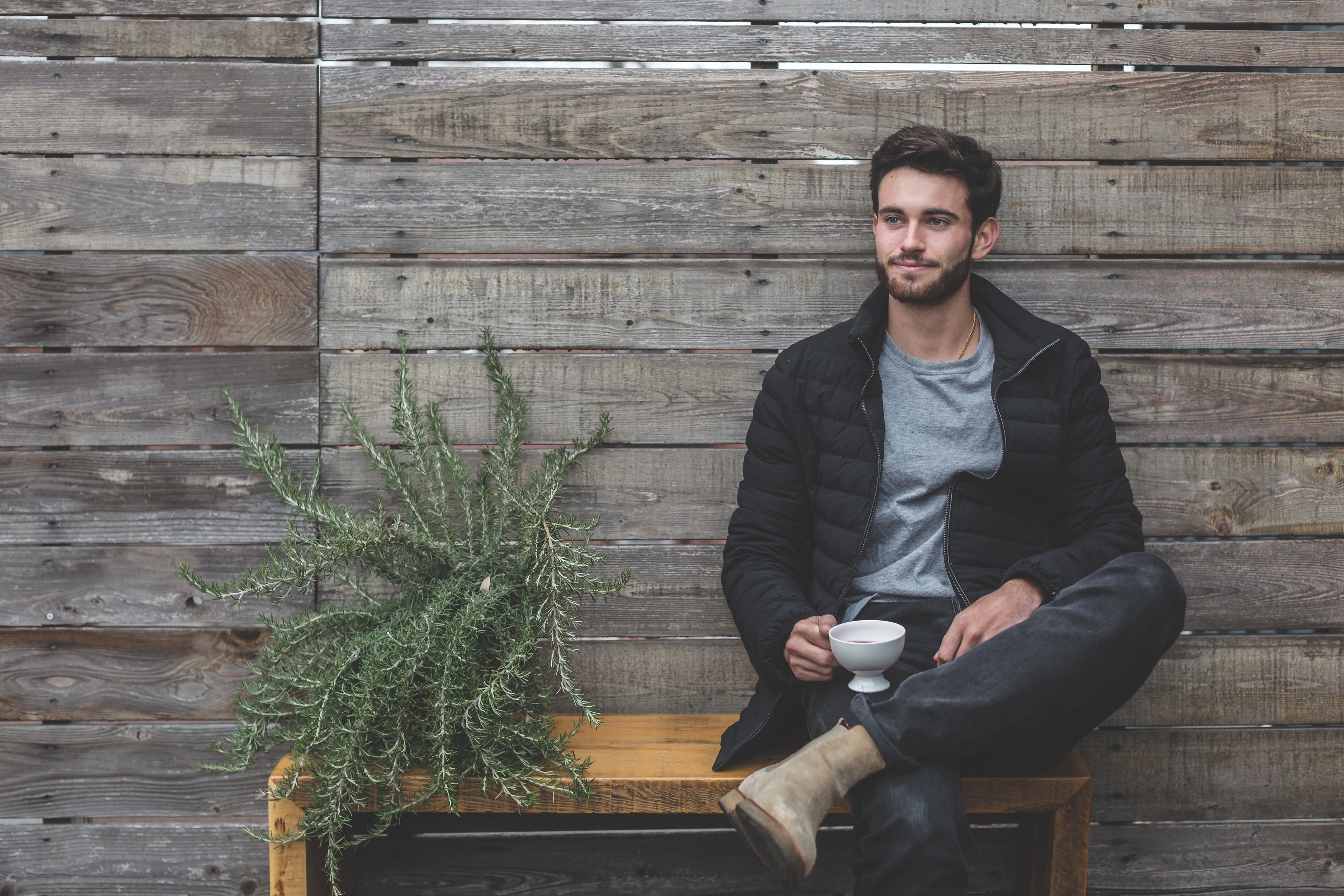 young man with beard and coffee